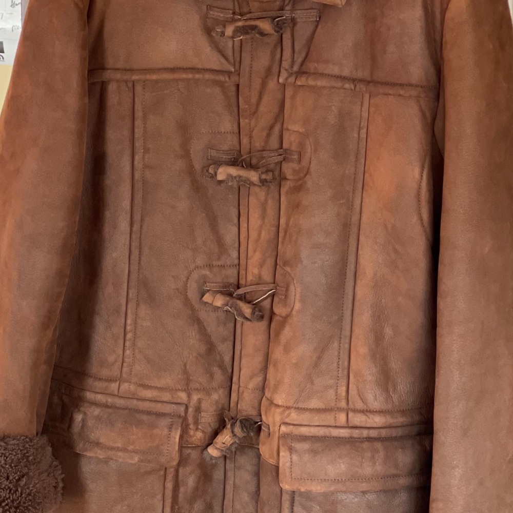 YVES SAINT LAURENT sheep skin winter coat.